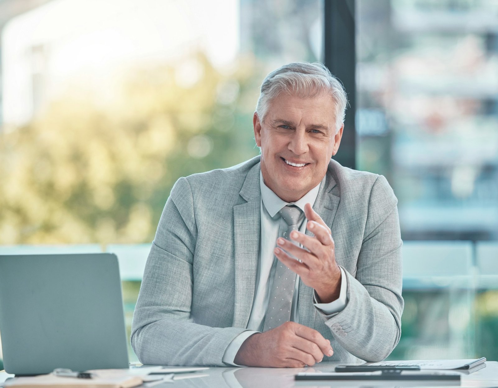 Senior business man, portrait and smile in office at corporate company for testimonial and motivati